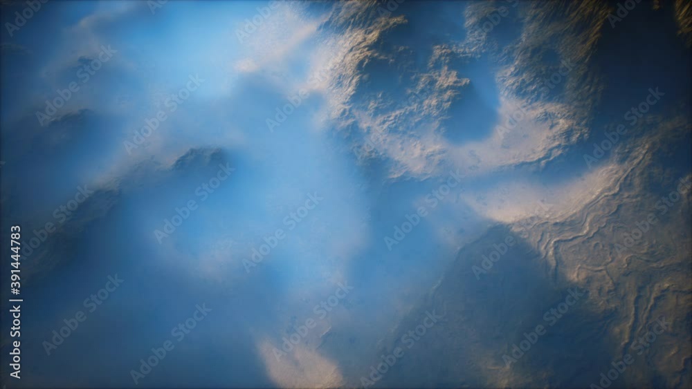Distant mountain range and thin layer of fog on the valleys Distant mountain range and thin layer of fog on the valleys