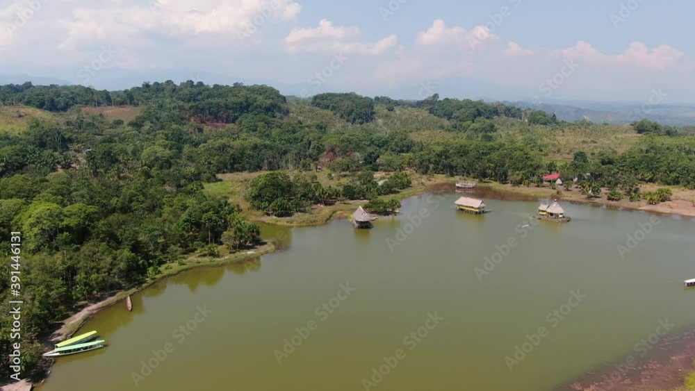 Beautiful 4k aerial drone video with an amazing panoramic view over the Laguna de los Milagros lake in Tingo Maria, the peruvian amazon jungle. Dolly in, wide angle shot Beautiful 4k aerial drone video with an amazing panoramic view over the Laguna de los Milagros lake in Tingo Maria, the peruvian amazon jungle. Dolly in, wide angle shot
