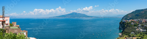 Panorama of Naples, Vesuvius volcano and Mediterranean sea, from Sorrento cliff with seaside villas and villages, a popular destination in Amalfi coast, Campany, Italy