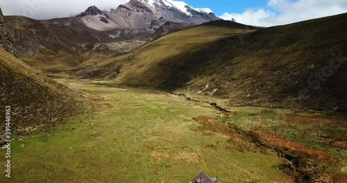 Aerial shot of cabin in the mountains