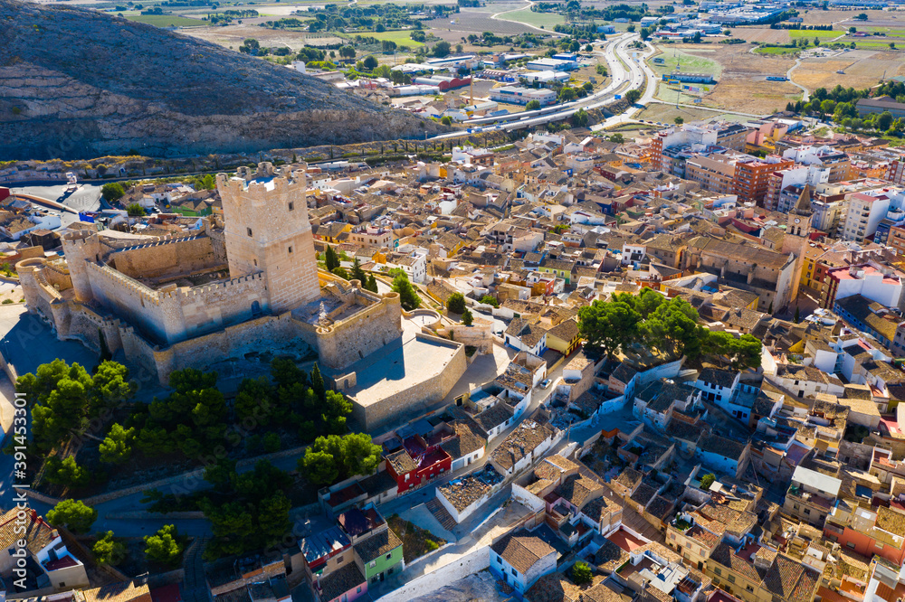 Picturesque aerial view of Spanish city of Villena with old castle Castillo de Castalla