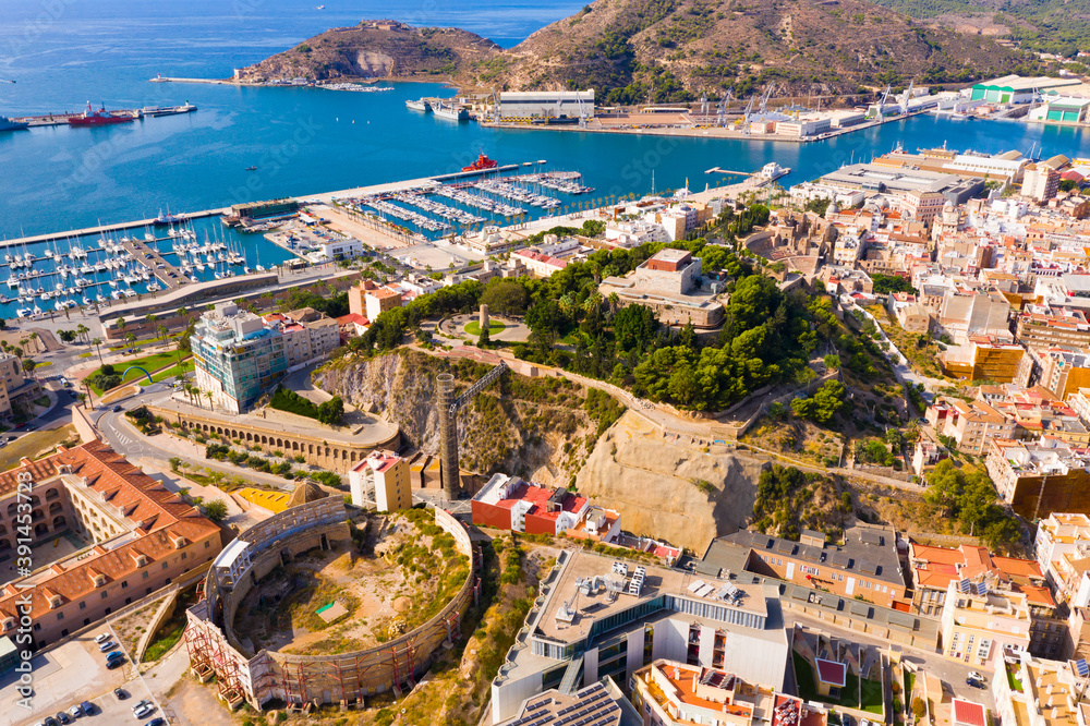 Aerial view of Cartagena port city with buildings and coast line, Autonomous Community of Murcia, southeastern Spain..