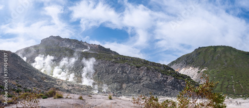 Panoramic view of active andesitic stratovolcano Mount Io photo