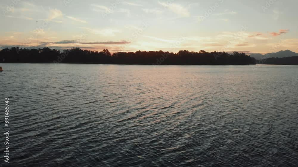 Beautiful sunset clip from a drone over Bellinger river in Myleston, Australia Beautiful sunset clip from a drone over Bellinger river in Myleston, Australia