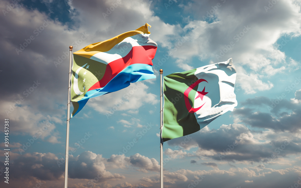 Beautiful national state flags of Algeria and Comoros together at the sky background. 3D artwork concept. Beautiful national state flags of Algeria and Comoros together at the sky background. 3D artwork concept.