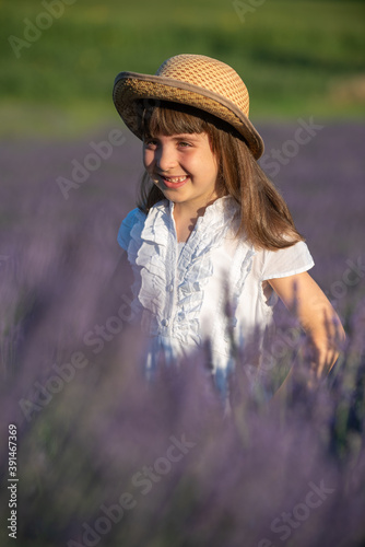 Beautiful little girl in a lavender field in Italy