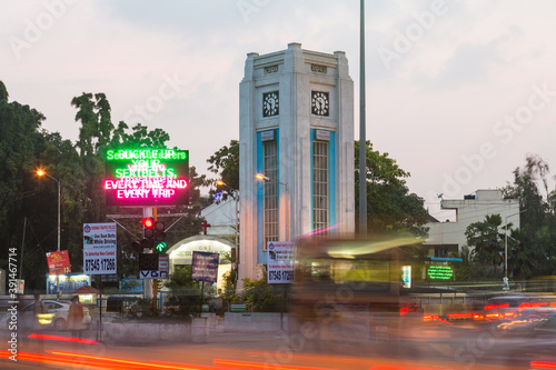 Exterior view of Art Deco Clock tower at Mint Junction, by Express Avenue Mall, in central Chennai, Chennai,  India. photo