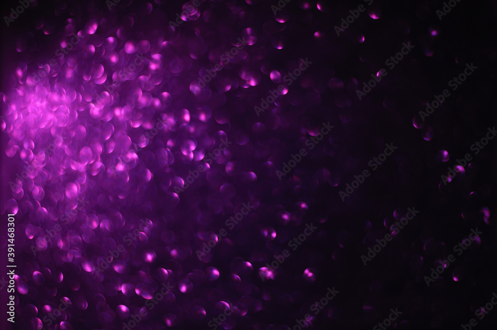 Purple sparkling defocused light on black background, Purple bokeh, abstract background stock photo, Christmas Decoration Purple sparkling defocused light on black background, Purple bokeh, abstract background stock photo, Christmas Decoration