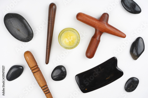 Massage tools set pattern on white background. Spa, body care, wellness, health concept. Top view, flat lay, copy space
