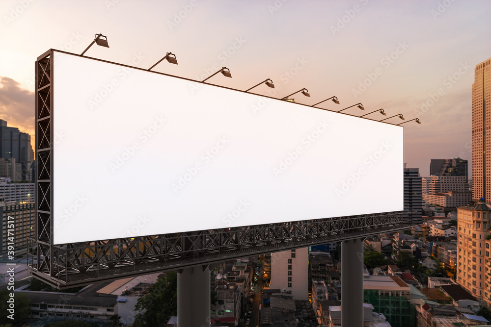 Blank white road billboard with Bangkok cityscape background at sunset. Street advertising poster, mock up, 3D rendering. Side view. The concept of marketing communication to promote or sell idea. Blank white road billboard with Bangkok cityscape background at sunset. Street advertising poster, mock up, 3D rendering. Side view. The concept of marketing communication to promote or sell idea.