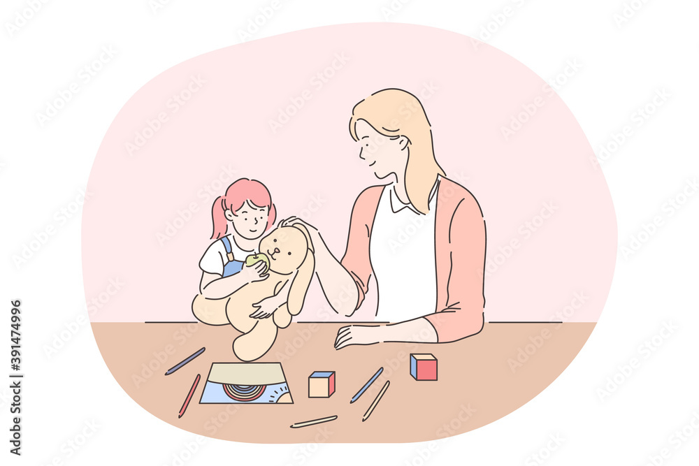 Happy leisure and activities at home with children concept. Young woman mother cartoon character playing, drawing and feeding toy together with her small daughter at home. Relax, rest, family Happy leisure and activities at home with children concept. Young woman mother cartoon character playing, drawing and feeding toy together with her small daughter at home. Relax, rest, family