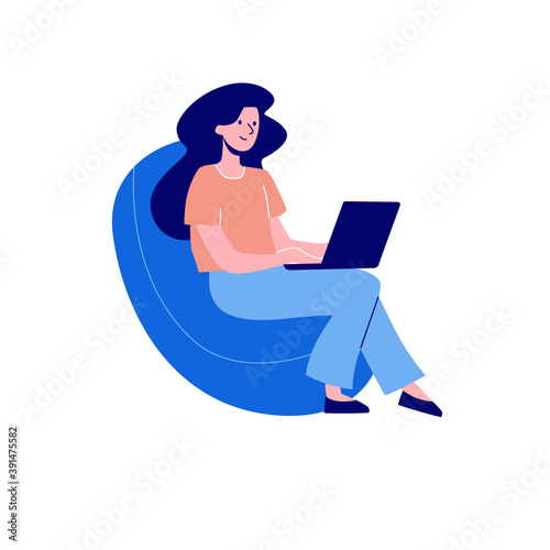 The girl works at a laptop, sitting in an easy chair. Vector illustration in a flat style. The woman studied at home, takes lessons online © Анна Канищева