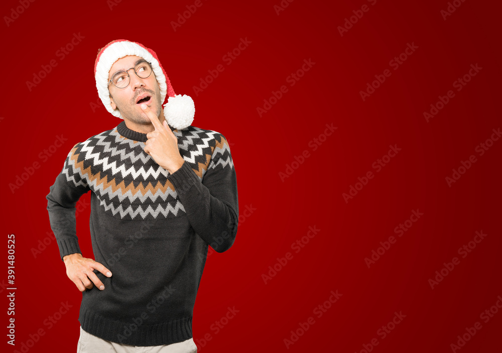 Christmas - Young man gesturing Christmas - Young man gesturing