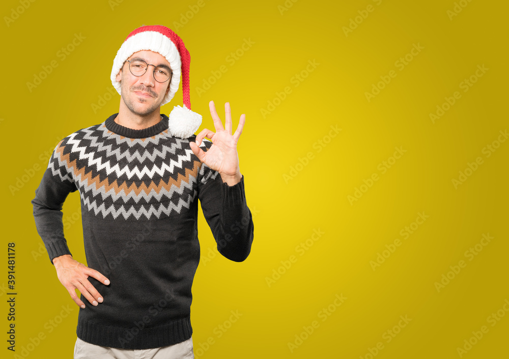 Christmas - Young man gesturing Christmas - Young man gesturing