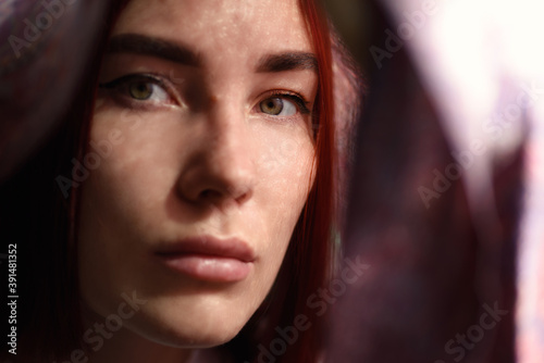 Portrait of a beautiful young woman. Selective focus.