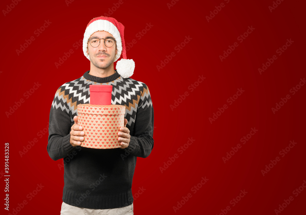 Christmas - Young man gesturing Christmas - Young man gesturing