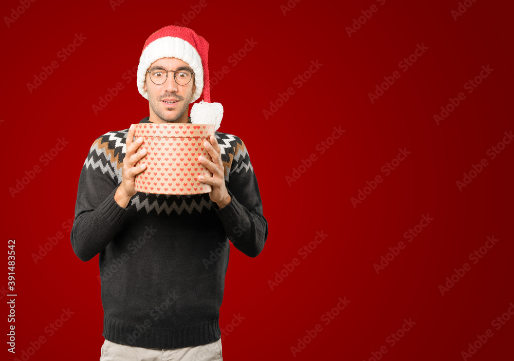 Christmas - Young man gesturing Christmas - Young man gesturing