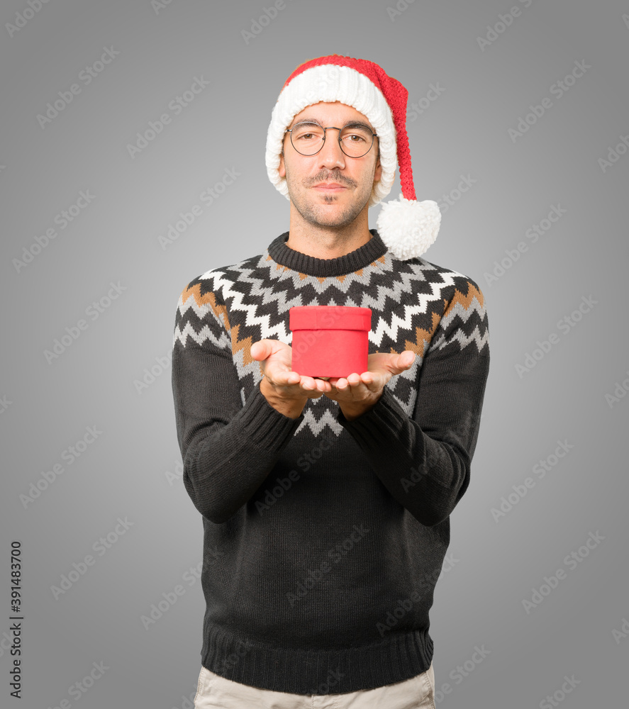 Christmas - Young man gesturing Christmas - Young man gesturing