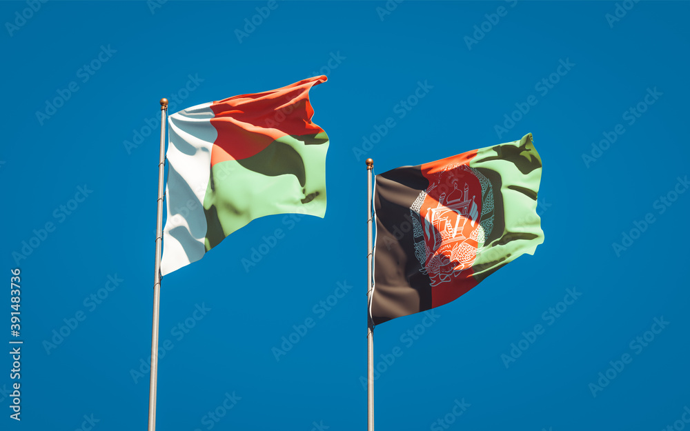 Beautiful national state flags of Madagascar and Afghanistan together at the sky background. 3D artwork concept.