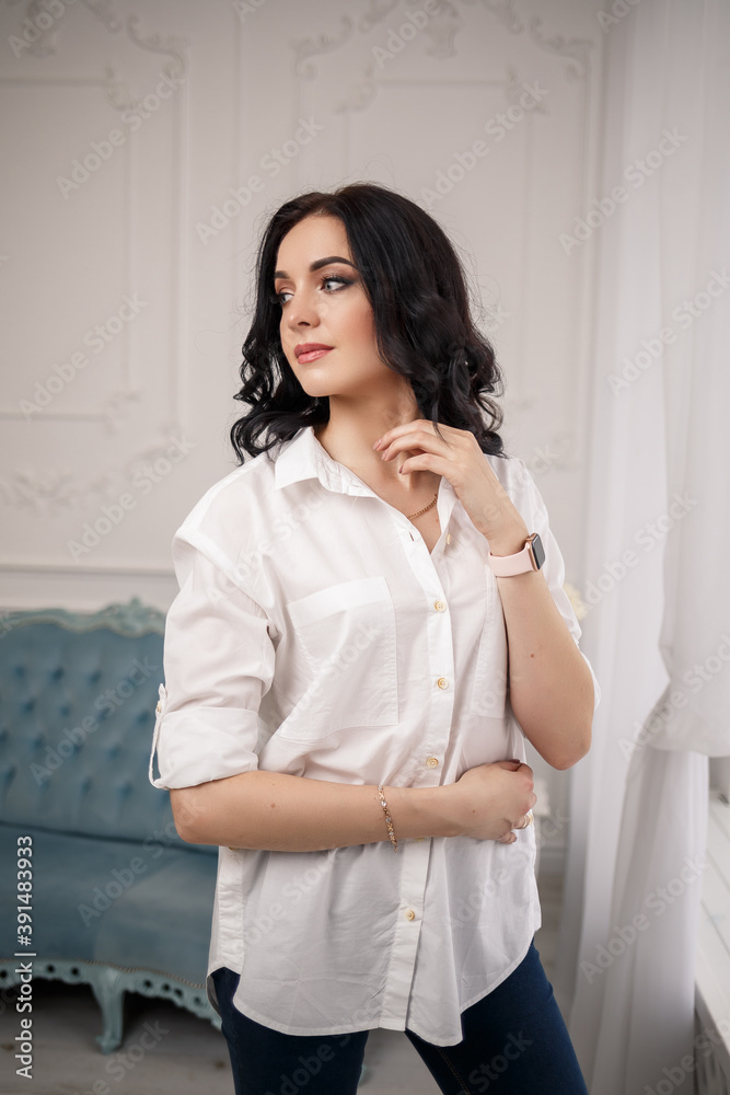 business portrait of a young female businessman. Dressed in a white shirt. Business style concept business portrait of a young female businessman. Dressed in a white shirt. Business style concept