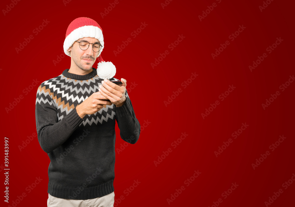 Christmas - Young man gesturing Christmas - Young man gesturing