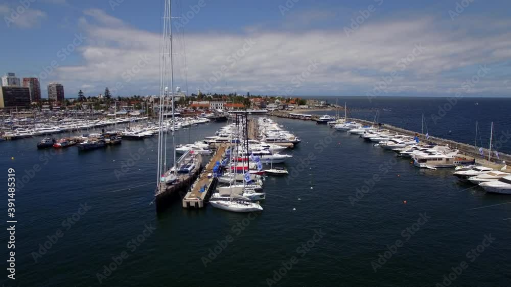 Aerial view of boats at the marina of Punta del Este during summer in Uruguay, South America. Aerial view of boats at the marina of Punta del Este during summer in Uruguay, South America.