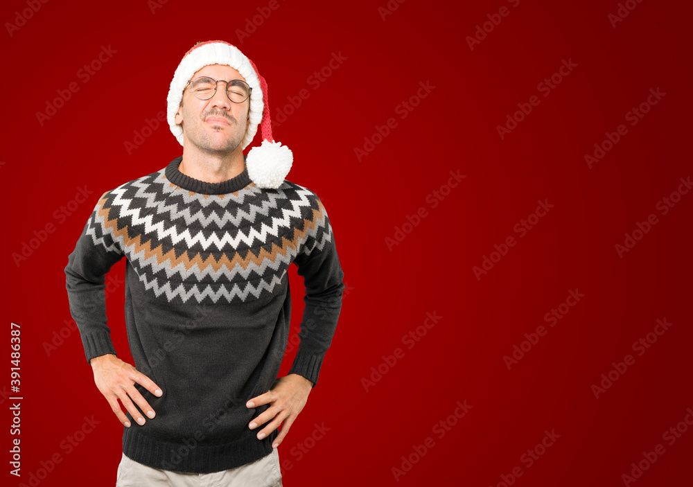 Fototapeta premium Christmas - Young man gesturing