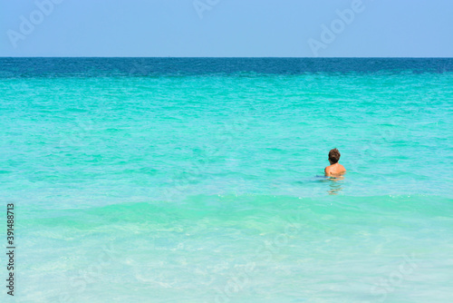 Man swimming in the sea.