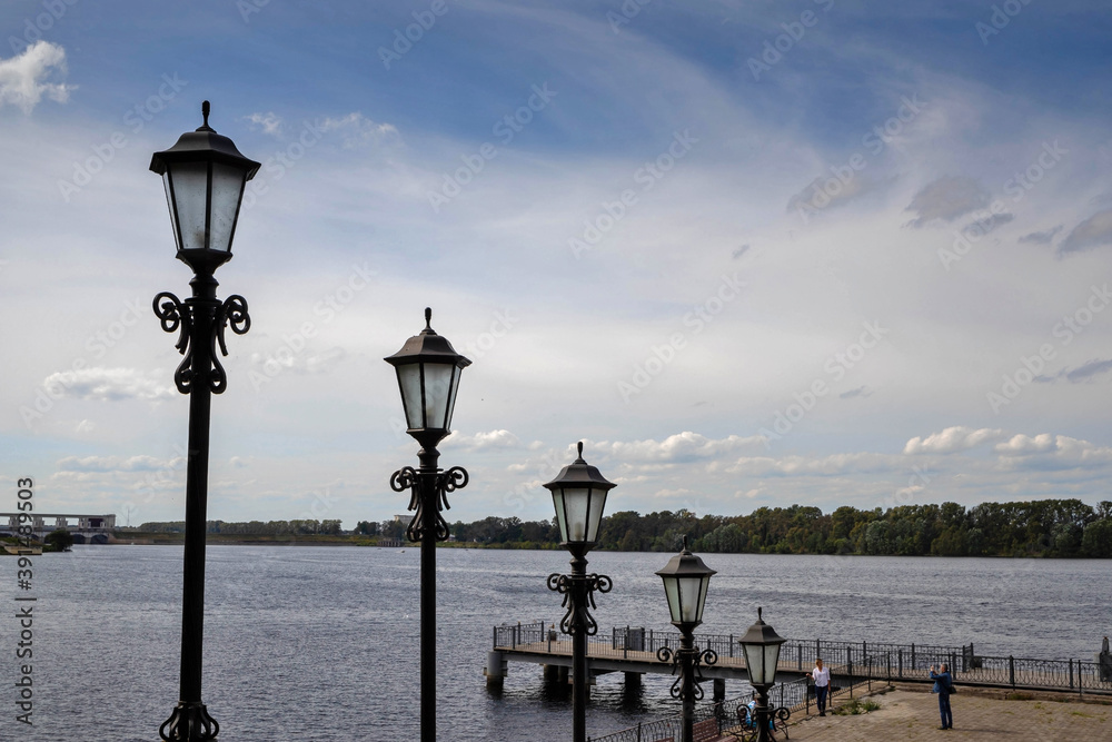Uglich. The Volga River Embankment. A slender row of beautiful lanterns. Rhythm. Prospect