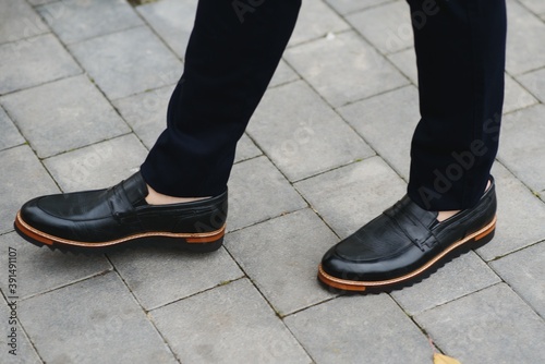 Male elegant shoes and trousers.