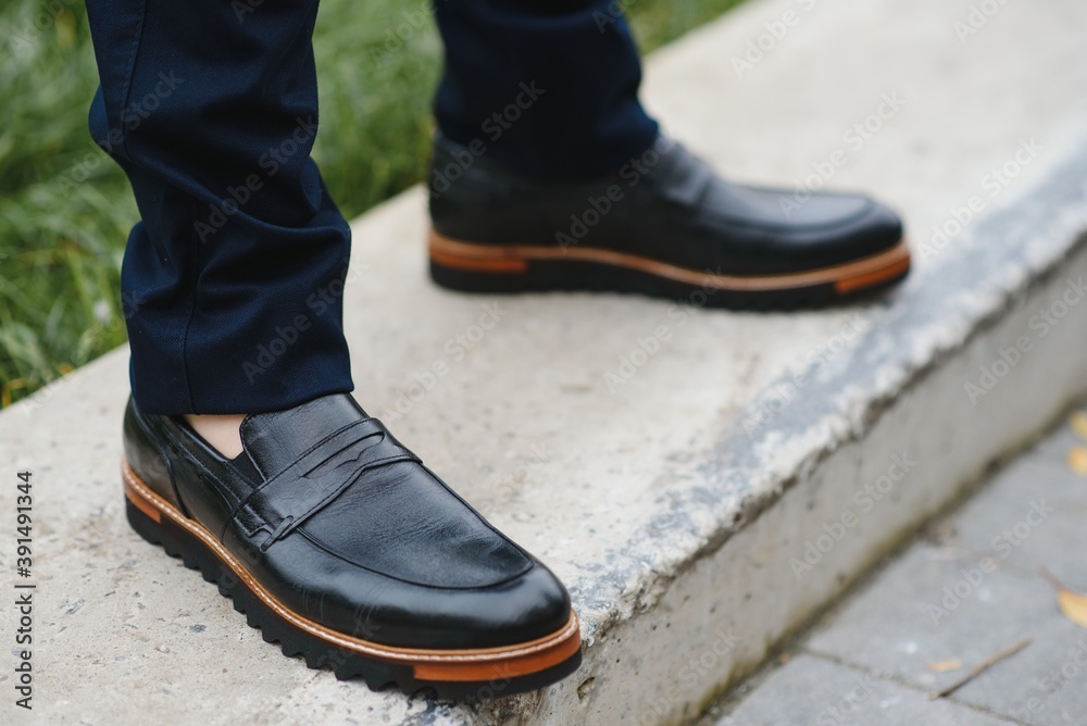 Male elegant shoes and trousers.