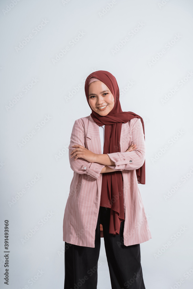 Happy business muslim woman portrait. Showing copy space on white background Happy business muslim woman portrait. Showing copy space on white background