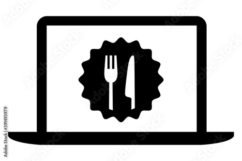 Knife and fork restaurant icon on laptop