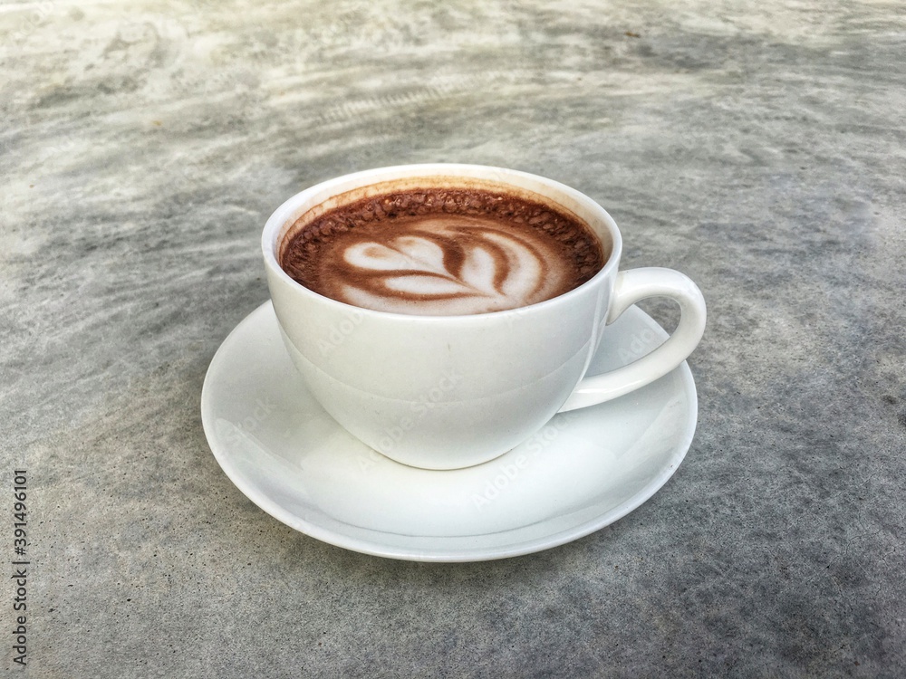 Fototapeta premium Hot cocoa in white cup. Hot chocolate in white cup.