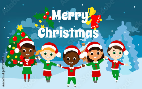 Cheerful happy children of different nationalities stand holding hands in front of Santa Claus house at Christmas. Children are dressed in traditional green and red elf costumes. An atmosphere joy.