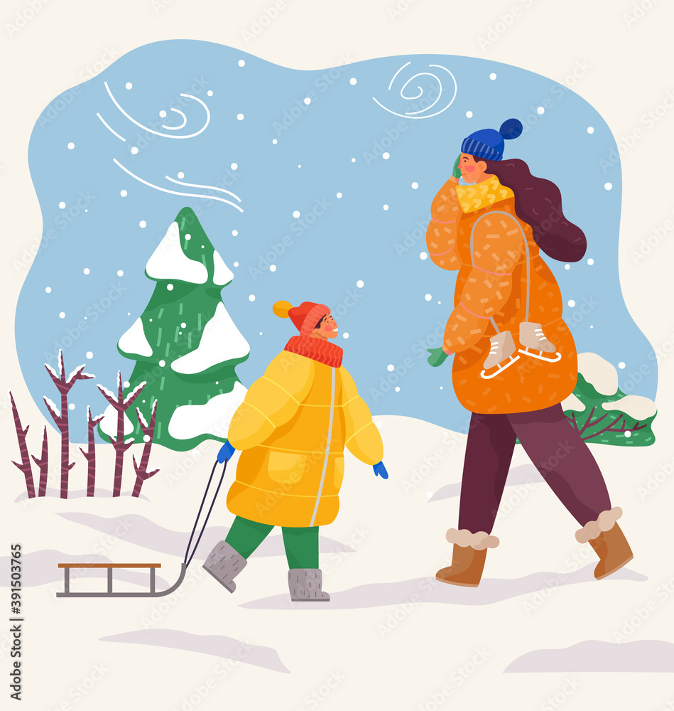 Couple mom and son walking in winter in cold weather. Happy family resting in warm clothes outdoors in cold winter. Mother is going to skate and child is going to sled. Winter outdoor activities