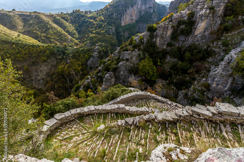 The Scala of Vradeto, a fantastic stone path, a real masterpiece of traditional engineering in Zagori region, Ioannina, Greece photo