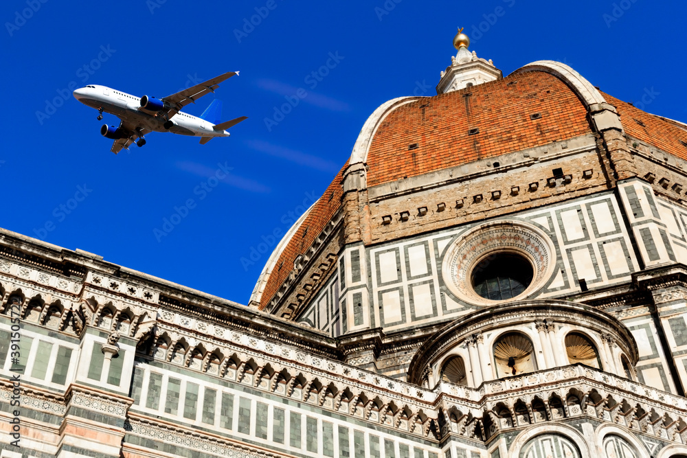 Fototapeta premium Aeroplane fly over city del fiore cathedral