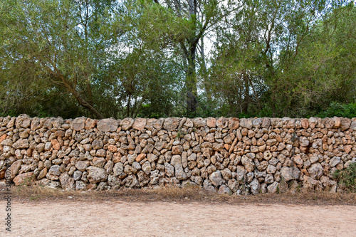wall background with orange stones and dirt
