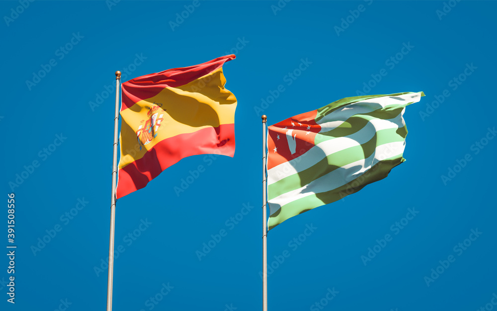Beautiful national state flags of Spain and Abkhazia. Beautiful national state flags of Spain and Abkhazia.