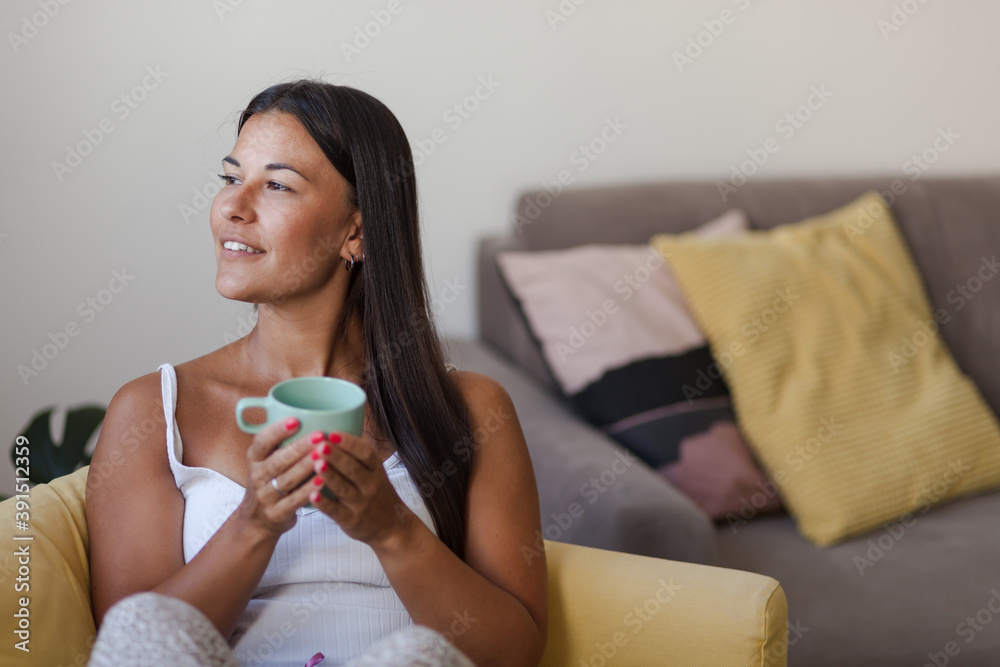 Happy woman day dreaming during morning coffee at home. Happy woman day dreaming during morning coffee at home.