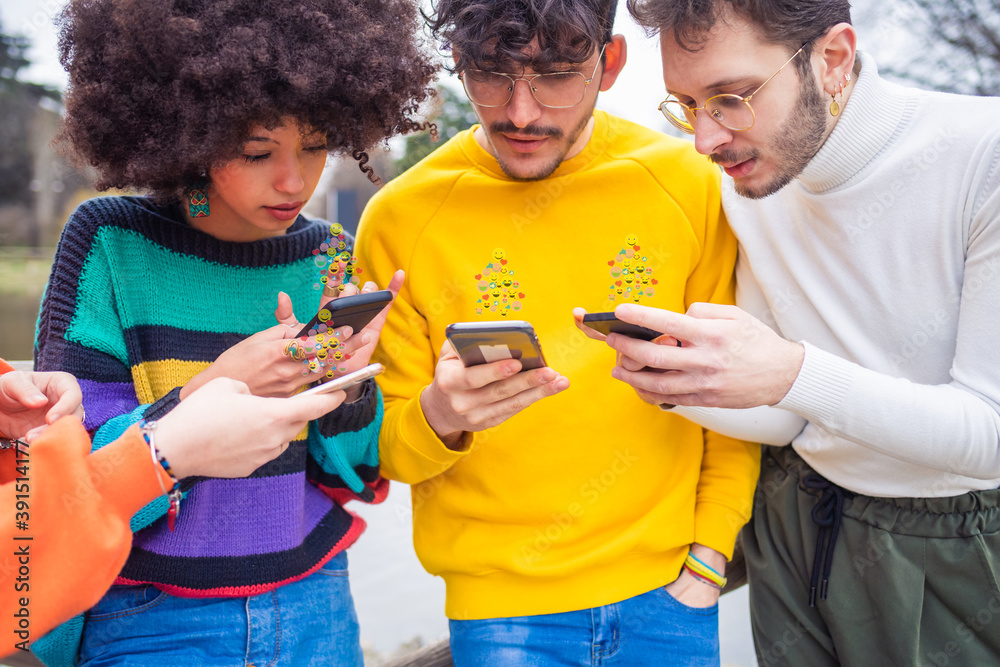 Group of multiethnic friends millennials using mobile phones Group of multiethnic friends millennials using mobile phones