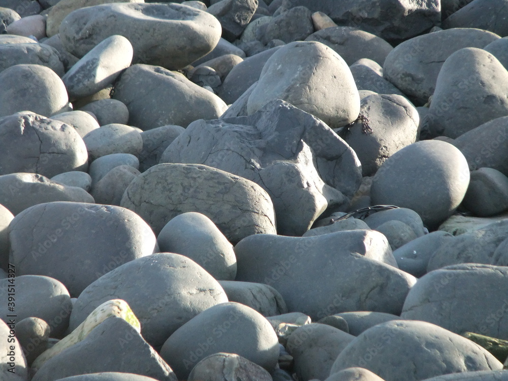 Fototapeta premium Pebbles on Bamburgh Beach