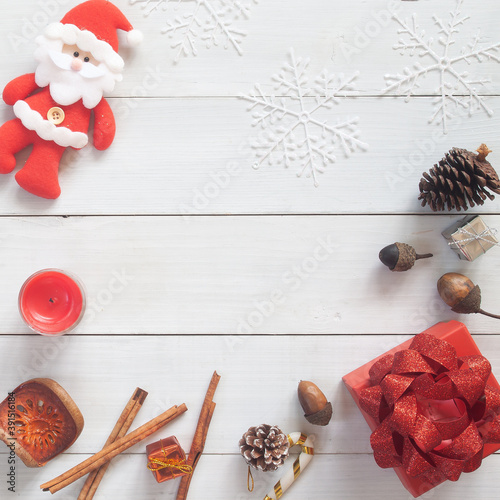 Christmas background with giftbox and decor. Top view with copy space