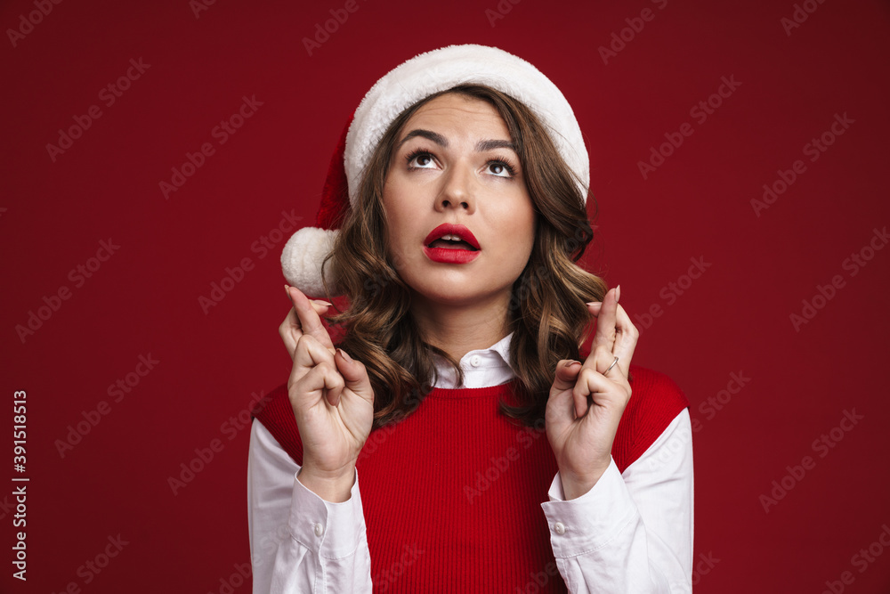 Worried young woman wearing xmas costume Worried young woman wearing xmas costume