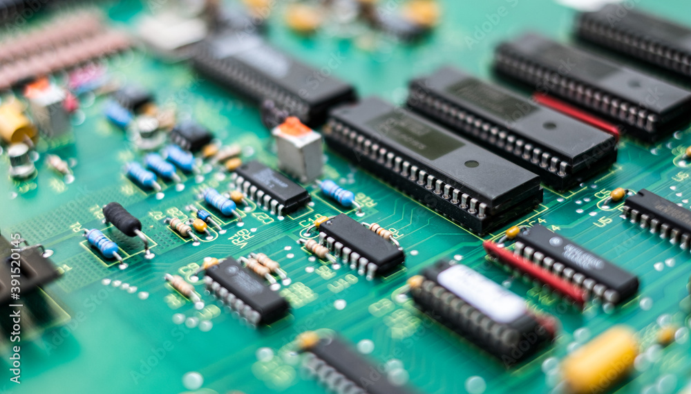 Closeup Electronic circuit board ( PCB )components detail and An integrated circuit (ic) Closeup Electronic circuit board ( PCB )components detail and An integrated circuit (ic)
