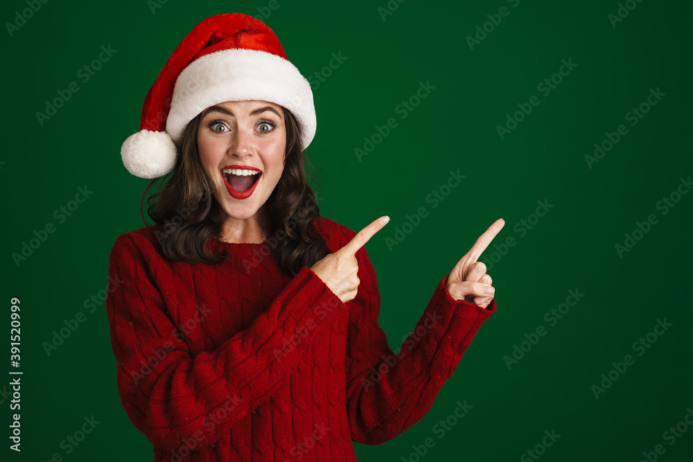 Beautiful excited young woman in red sweater