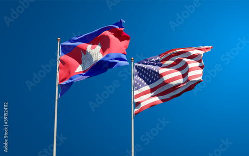 Beautiful national state flags of USA and Cambodia together at the sky background. 3D artwork concept.