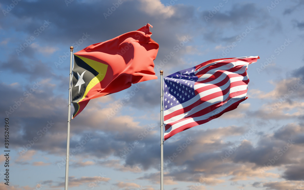 Beautiful national state flags of East Timor and USA together at the sky background. 3D artwork concept. Beautiful national state flags of East Timor and USA together at the sky background. 3D artwork concept.