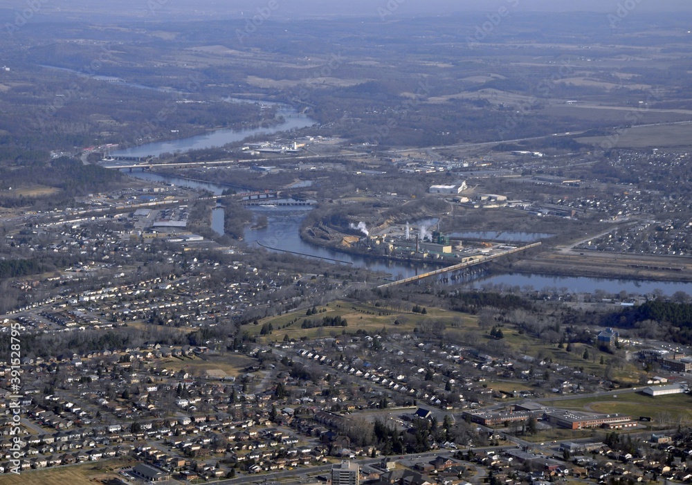 Obraz premium Aerial view of Trenton Ontario, neighborhoods and infrastructure along the River Trent in Ontario Canada early Spring